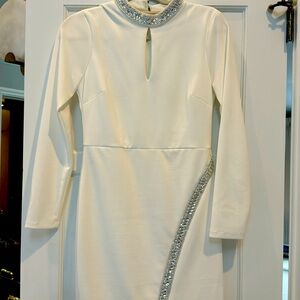 Guess white dress with rhinestones. Fits tight and hits above knee.